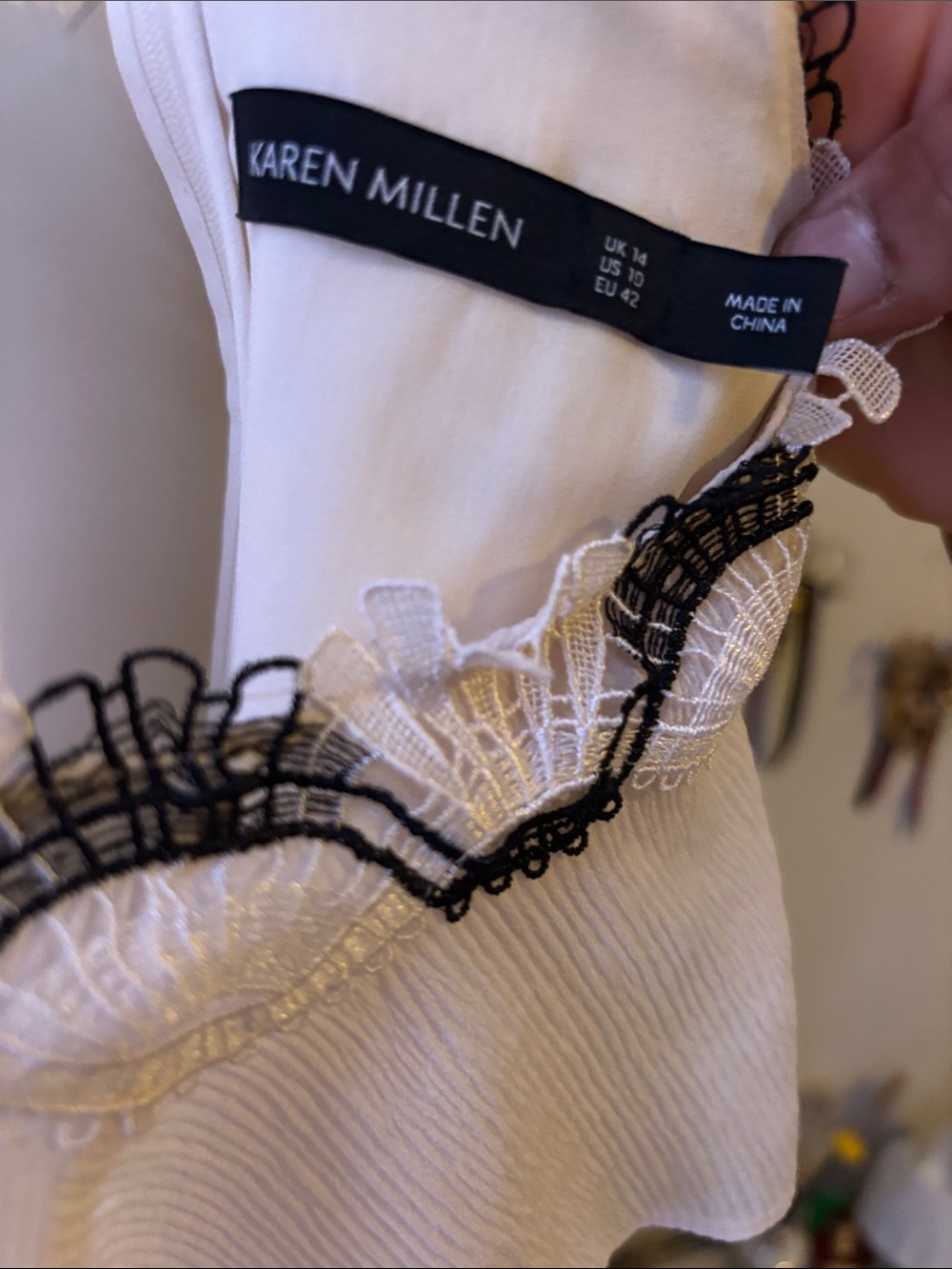 Off-Shoulder White Ruffle Camisole with Black Trim - Picture 9 of 9